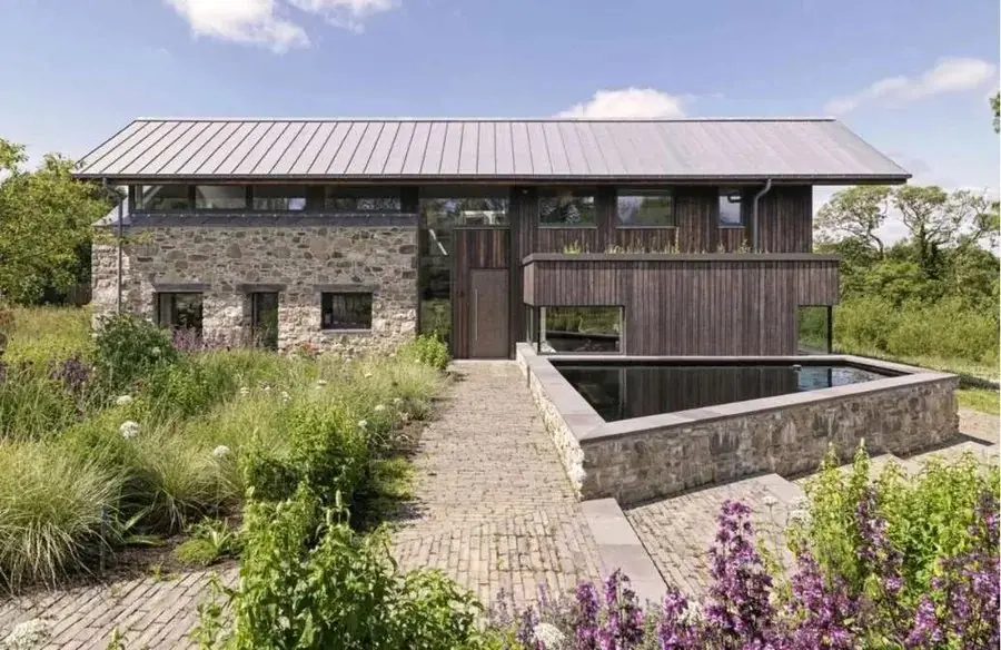Rhigian Residence in Pembrokeshire, stone and timber house with a whole life carbon rating A